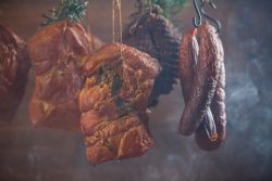 Smoked pork in a homemade smokehouse